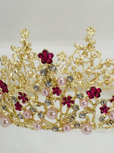 crown in yellow metal