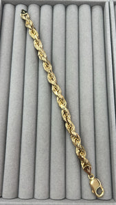 silver rope chain bracelet with 24k yellow gold plating; 20.1g; 8 inches; thickness 8mm; made in Italy