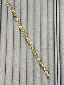 silver rope chain bracelet with 24k yellow gold plating;10.35g; around 7.5 inches; thickness 6.3mm; made in Italy