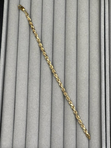 silver rope chain bracelet with 24k yellow gold plating; 6g; around 7.5 inches; thickness 3.7mm; made in Italy