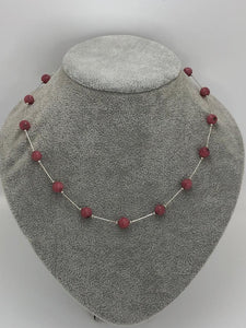 silver necklace with pink rhodonite