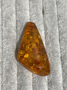 treated amber in a triangular form
