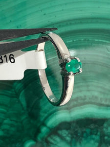 Platinum ring with emerald