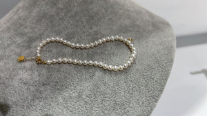 seed pearl bracelet with 18k gold