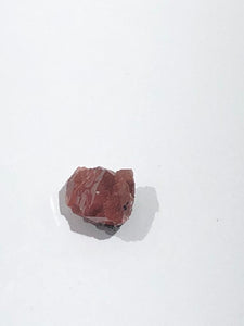 rough rhodochrosite from Peru