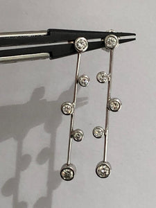 18k white gold drop earrings with diamonds