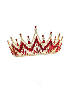 luxury tiara with red rhinestones and in gold colour metal