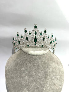 tiara with green rhinestones and silver colour metal