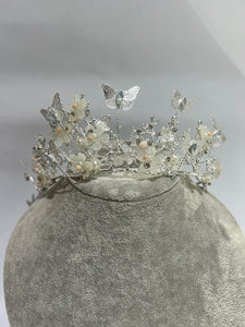 tiara with butterflies and flowers with rhinestones and faux pearls and silver colour metal