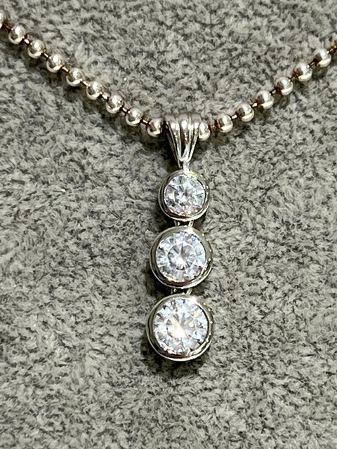 silver trilogy drop pendant with cz in rubber set; 2.5g; chain is not included