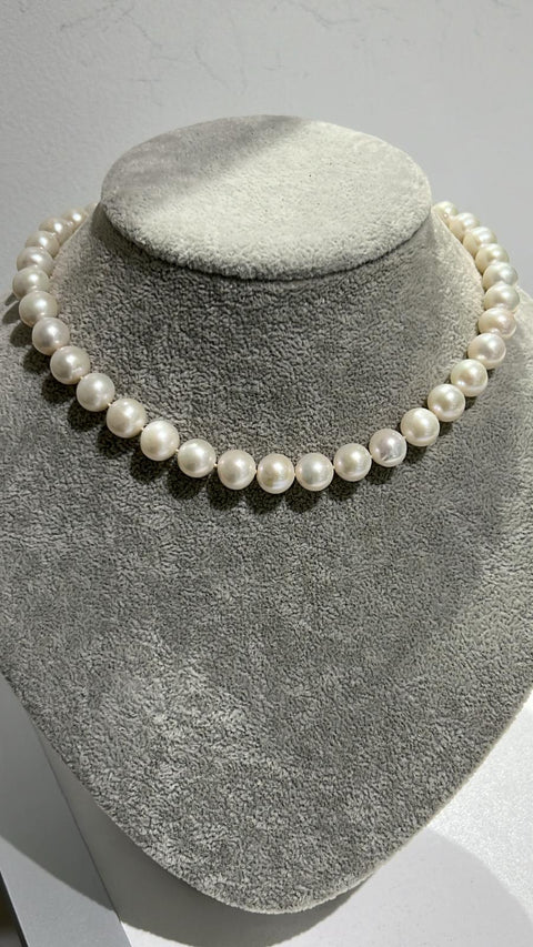Freshwater pearl necklace with silver clasp; around 16 inches; each pearl around 9.5mm