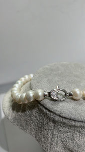 Freshwater pearl necklace with silver clasp; around 16 inches