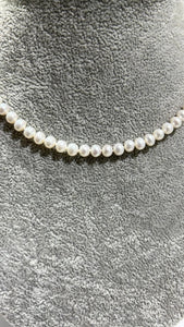 Freshwater necklace with silver gold plated clasp; around 16 inches