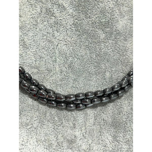 necklace made of magnetite beads with metal clasp; 17 inches
