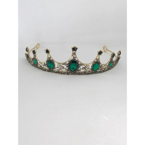 black/gold coloured small tiara with green stones