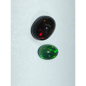 2.50cts black opal parcel (2 stones); sizes are 10x7.8x6.7mm and 7.9x5.85x2.2mm